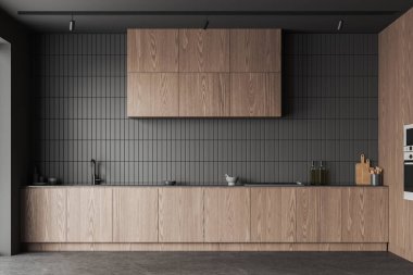 Gri fayanslar, ahşap mutfak iç mimarisi, mutfak gereçleri, gri beton zemin. Modern dairede aletleri olan lüks bir aşçılık alanı. 3B görüntüleme