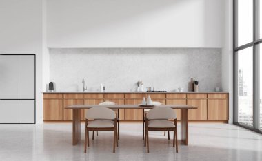 Yemek masası, sandalyeler, aydınlık beton zemin. Beyaz yemek odası, dolap, buzdolabı ve gökdelenlerde panoramik pencere. 3B görüntüleme