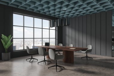 Masasında sandalyeler ve dizüstü bilgisayarlar olan karanlık bir iç mekan, yan görüş gri beton zemin. Şık bir ofis toplantısı ve ortak çalışma köşesi, New York 'ta bölünme ve panoramik pencere. 3B görüntüleme