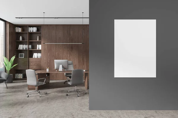 Dark office room interior with pc computer on desk, ceo workplace with cabinet and folders. Panoramic window on skyscrapers. Mockup canvas poster on partition. 3D rendering
