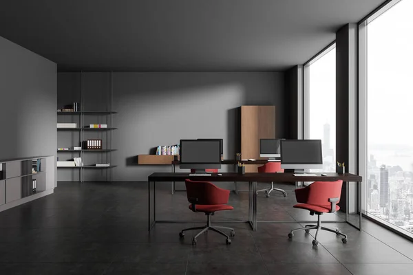 Dark Coworking Interior Red Armchairs Computers Desk Grey Tile Concrete — Stock Photo, Image