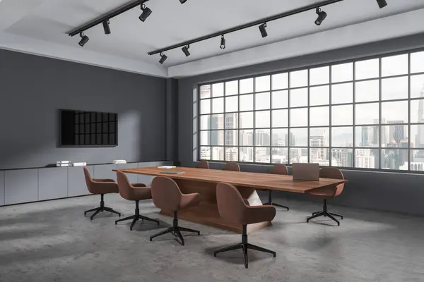 Dark meeting interior with armchairs and meeting board, side view sideboard with tv display. Ceo negotiation corner with panoramic window on Kuala Lumpur skyscrapers. 3D rendering