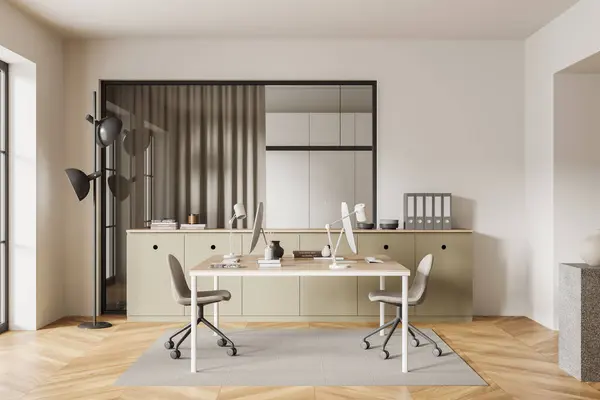 Stylish beige work space interior with pc monitors on a shared table, sideboard with folders and decoration. Minimalist office workplace with carpet on hardwood floor. 3D rendering