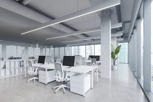 White office interior with pc computers on desk in row, side view shelf and glass meeting room. Modern work corner with columns and panoramic window on Singapore. 3D rendering