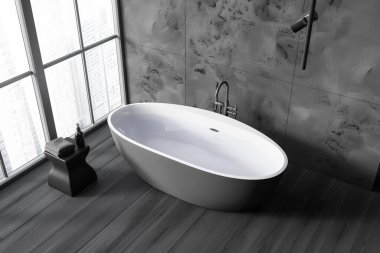 Gri mermer duvarları, koyu ahşap zemini ve şehir manzaralı pencerenin yanında duran rahat gri küveti olan şık bir banyo manzarası. 3d oluşturma