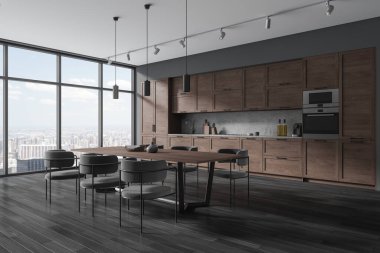 Gri duvarları, ahşap zemini, rahat siyah ahşap dolapları, dolapları ve panoramik pencerenin yanında duran gri sandalyeli uzun yemek masasının köşesi. 3d oluşturma