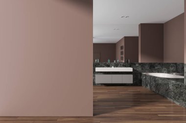 Kahverengi ve mermer duvarlı şık bir banyo, koyu ahşap zemin, büyük küvet, büyük aynalı rahat çift lavabo ve solunda uzay duvarının kopyası. 3d oluşturma