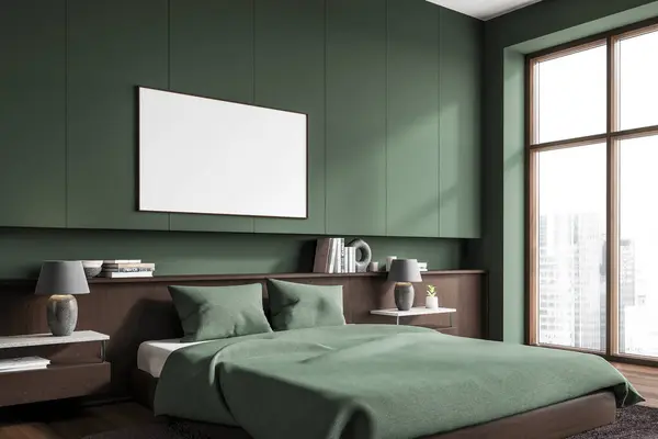 Corner of stylish bedroom with green walls, dark wooden floor, comfortable king size bed with green blanket and horizontal mock up poster hanging above it. 3d rendering