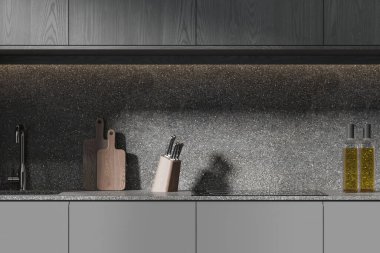 Gri duvarları olan şık bir mutfak, koyu ahşap dolaplar modern lavabo ve rahat gri dolaplarda yapılmış fırın. 3d oluşturma