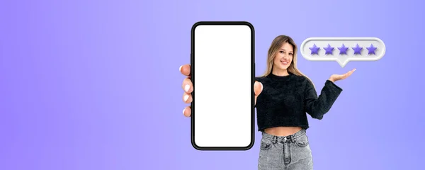Smiling Young Woman Hand Showing Mockup Phone Screen Purple Background — Stock Photo, Image