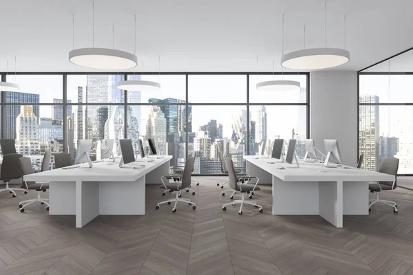 White corporate loft interior with pc computers, coworking space with armchairs and shared desk on hardwood floor. Panoramic window on New York skyscrapers. 3D rendering