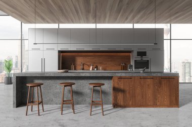 Ahşap duvarları, beton zemini, gri dolapları, dolapları ve tabureli gri ve ahşap adaları olan şık panoramik mutfağın içi. 3d oluşturma