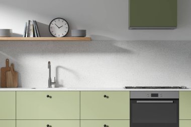 Minimalist tasarımı olan yeşil lüks ev mutfağı, mutfak gereçleri ve kapüşonlu lavabo ve soba. Modern dairede dekorasyonu olan rahat bir yemek odası. 3B görüntüleme