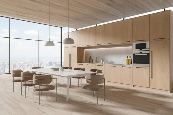 Corner of modern panoramic kitchen with white walls, wooden floor, cozy wooden cabinets and cupboards and long dining table with chairs. 3d rendering