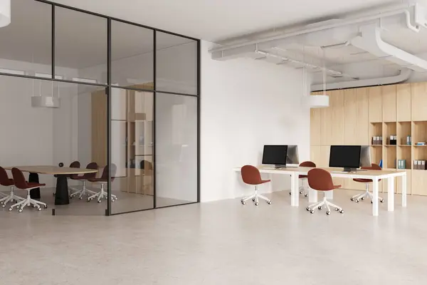 Interior of stylish open space office with white walls, concrete floor, row of computer desks with red chairs standing near wooden bookcase and glass wall meeting room next to it. 3d rendering