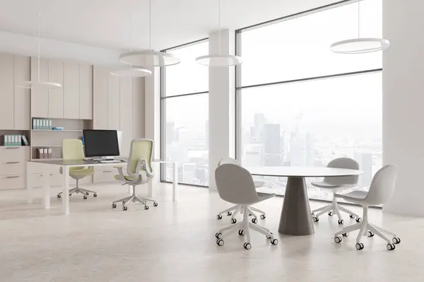 Cozy business interior with pc desktop on table and meeting area, side view light concrete floor. Stylish office room with panoramic window on Paris skyscrapers. 3D rendering
