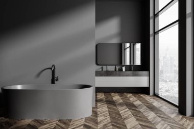 Gri duvarları olan şık bir banyo, koyu ahşap zemin, fotokopi duvarı olan rahat gri küvet ve büyük pencerenin yanında asılı büyük aynalı rahat çift lavabo. 3d oluşturma
