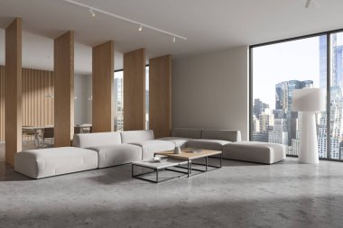 Beyaz ve ahşap duvarları, beton zemini, kare sehpaların yanında duran rahat gri kanepe ve arka planda uzun masa ve sandalyeleri olan modern oturma odasının içi. 3d oluşturma