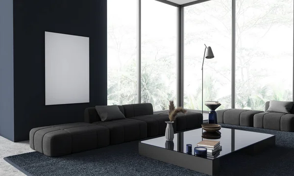 Corner of stylish living room with blue walls, concrete floor, two comfortable gray couches standing near coffee table and vertical mock up poster. 3d rendering