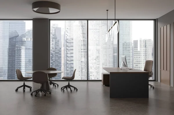 Dark business room interior with pc computer on desk, chairs with meeting table. Minimalist workspace with panoramic window on Singapore skyscrapers. 3D rendering