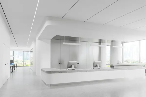 Cozy reception interior with pc computers on table, side view light granite floor. White business loft with lobby and workspace near panoramic New York skyscrapers. 3D rendering