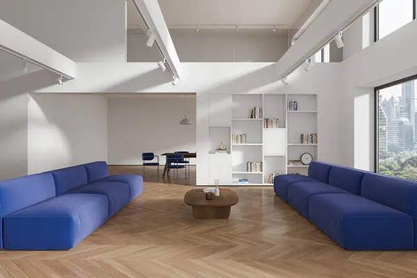 Luxury home living room interior with sofa and shelf with books, dinner table with chairs behind partition. Two-storey hall and panoramic window on New York skyscrapers. 3D rendering