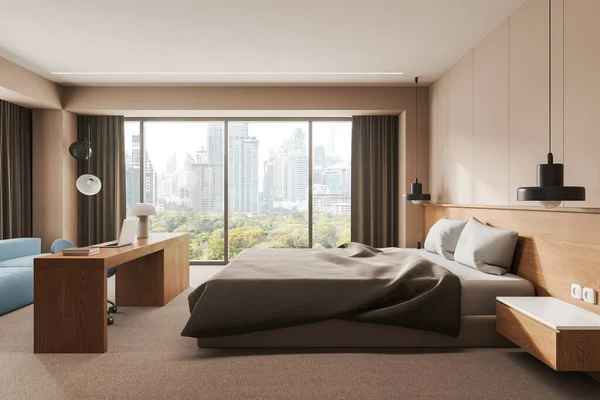 Cozy home bedroom interior with bed, workspace and chair with wood table. Sleep and work zone with sofa and panoramic window on New York skyscrapers. 3D rendering