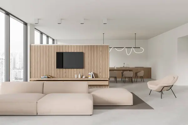 Stylish home studio interior with sofa and tv console, wall partition and panoramic window on skyscrapers. Meeting and eating space with chairs and table. 3D rendering