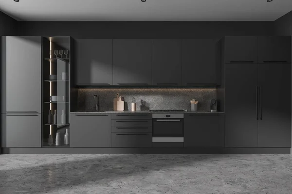 Interior of stylish kitchen with gray walls, concrete floor, cozy gray cabinets with built in sink, cooker and oven and comfortable gray and glass door cupboards. 3d rendering