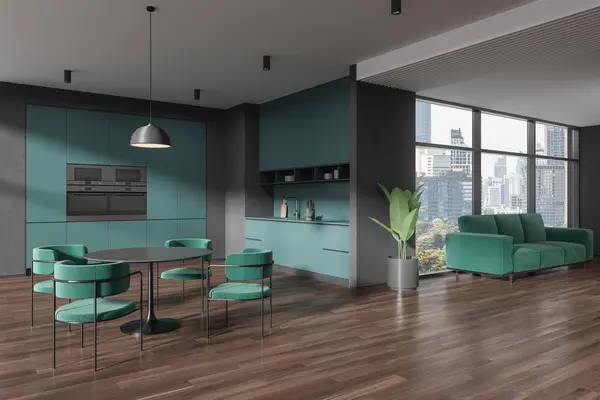 Grey and turquoise home flat studio interior with dining table and chairs. Corner view of cooking cabinet and sofa near panoramic window on New York skyscrapers. 3D rendering