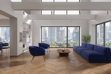 Beyaz duvarları, ahşap zemini, kahve masası ve beyaz kitaplığın yanında duran iki rahat mavi koltuk ve kanepesi olan modern oturma odasının içi. 3d oluşturma