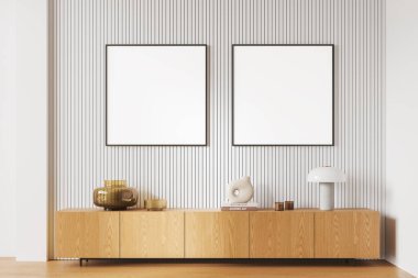 Şık bir oturma odası ahşap büfe, minimalist sanat dekorasyonu ve kitaplarla dolu. Beyaz duvarda sıra sıra dizilmiş iki kare tuval posteri. 3B görüntüleme