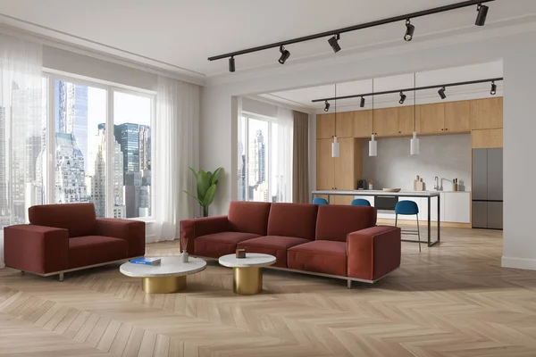 White and wooden home studio interior with sofa and coffee table, side view bar island with cabinet and refrigerator. Panoramic window on New York skyscrapers. 3D rendering