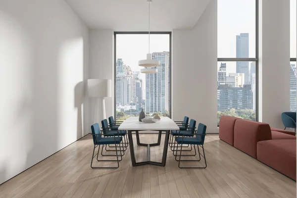 White home living room interior with dinner table and chairs, brown sofa in chill zone. Elegant studio loft in with panoramic window on New York skyscrapers. 3D rendering