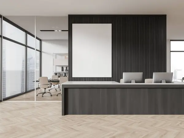 Interior of stylish office hall with white and dark wooden walls, wooden floor and comfortable wooden reception desk with computers and mock up poster behind it. 3d rendering