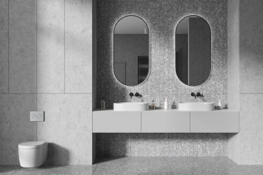 Modern banyo, beyaz duvarlar, beton zemin, rahat çift lavabo, iki oval ayna ve klozet. 3d oluşturma