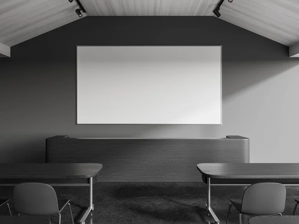 Interior of stylish college classroom with gray walls, concrete floor, cozy tables with gray chairs and blank whiteboard hanging above lecturers table. 3d rendering