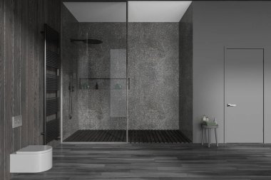 Karanlık modern banyo, cam duş ve duvara asılmış tuvalet, aksesuarlı sehpa ve havlu korkuluğu. Lüks dairede kapısı olan bir tuvalet. 3B görüntüleme