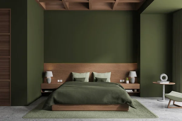 Dark home bedroom interior with bed and nightstand on carpet, grey concrete floor. Relax or sleep room with decoration and mockup empty green wall. 3D rendering