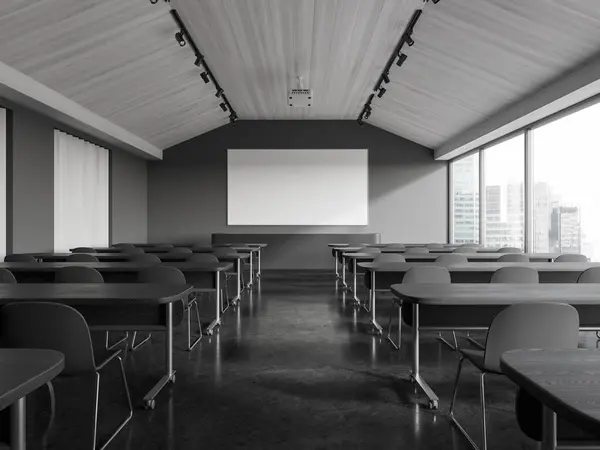 Dark audience interior with chairs and desk in row, mock up copy space projection screen on wall. Training or business education space with panoramic window on skyscrapers. 3D rendering