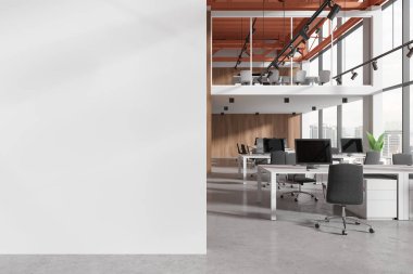 Stylish office interior with pc computers and shared desk in row. Two-storey coworking room with panoramic window on Kuala Lumpur skyscrapers. Mock up copy space wall partition. 3D rendering