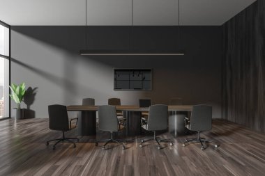 Dark office interior with board and armchairs, laptop and tv screen on wall. Business conference space with panoramic window on Kuala Lumpur skyscrapers. 3D rendering