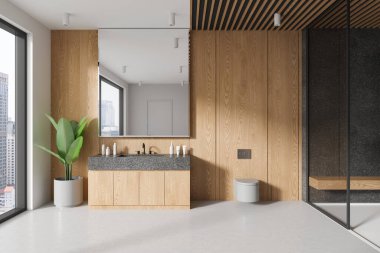 Luxury hotel bathroom interior sink and glass shower, wall hung toilet and accessories. Stylish bathing space and panoramic window on skyscrapers. 3D rendering