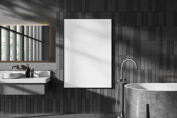 Dark home bathroom interior with sink and mirror, vanity with minimalist accessories and panoramic window on tropics. Bathtub and mockup copy space canvas poster on tile wall. 3D rendering