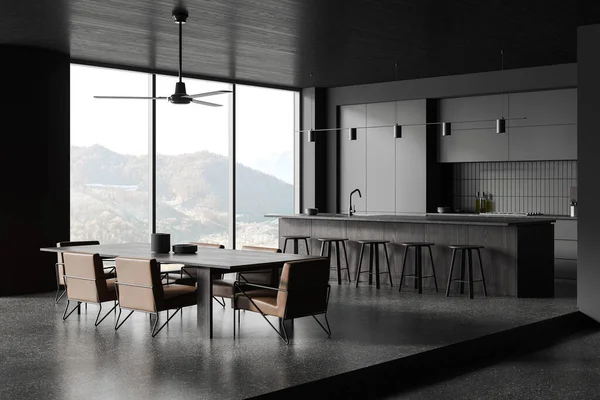 Dark home kitchen interior with bar island and dining table with chairs, cabinet with kitchenware. Eating and cooking corner, panoramic window on countryside. 3D rendering