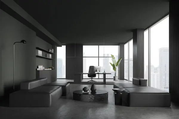Dark office room interior with chill zone and leather sofa, pc computer on work table, sideboard with decoration. Panoramic window on Bangkok skyscrapers. 3D rendering