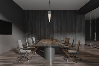 Ahşap zeminde tahta, dizüstü bilgisayar ve koltuklarla modern bir konferans. Duvarında minimalist mobilyalar ve televizyon olan cam toplantı alanı. 3B görüntüleme