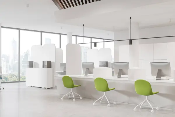 Corner view of office interior with seats and pc desktop, side view sideboard on light concrete floor. Office business corner and panoramic window on Bangkok skyscrapers. 3D rendering