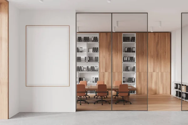 White and wooden office interior with meeting table and armchairs, mock up canvas poster on partition. Glass conference room with armchairs and shelf with folders. 3D rendering