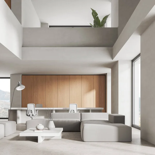 Two-storey office interior with chill zone, sofa and coworking space with furniture. Panoramic window on countryside. Cozy workspace with technology. 3D rendering